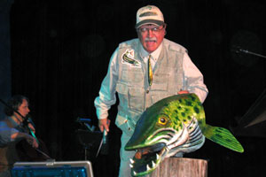 Warren Nelson onstage during a performance of Riverpants